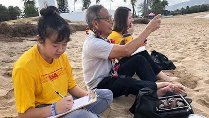 Students in the North Shore Ethnographic Field School conduct interviews with Kenneth Segawa (elders) in Waialua, O‘ahu